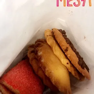 5 assorted Salvadoran pastries filled with fruit or topped with chocolate for $1.95!