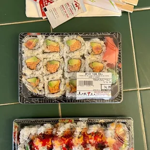 two trays of sushi