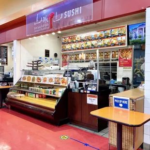 the interior of a sushi restaurant