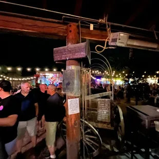 a crowd of people at a night market