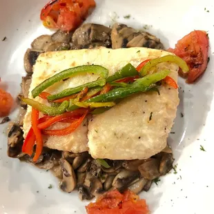 Pan grilled Halibut loin with lemon butter sautéed mushrooms