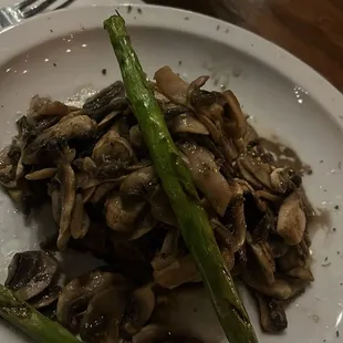 Filet Mignon under the little pile of mushrooms