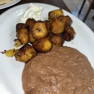 a plate of mexican food and a side dish
