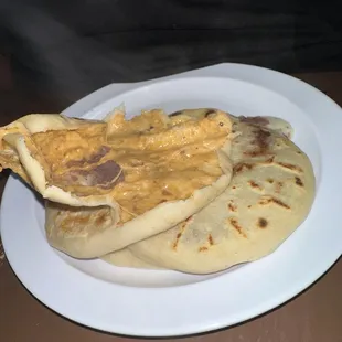 a plate of flatbreads on a table