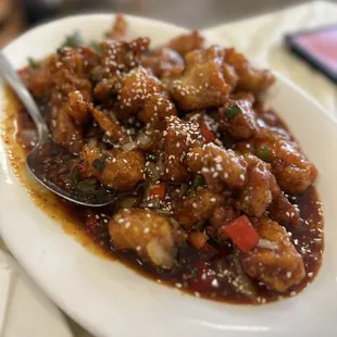 a plate of food with a spoon