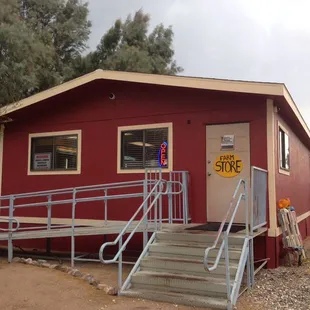 a red building with stairs leading up to it