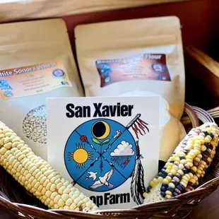 a basket of corn and seeds