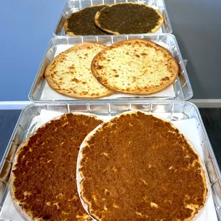 three different types of pizzas