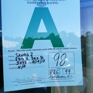 a sign in the window of a business