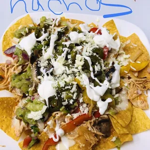a plate of nachos on a table