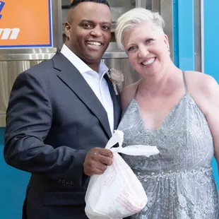 a man and a woman posing for a picture