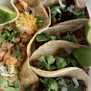 Two chicken , two carne asada, two al pastor tacos.