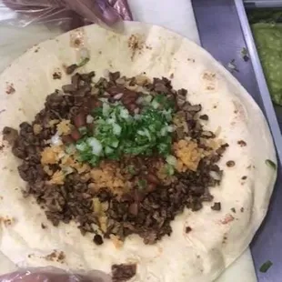 Asada burrito(before rolled up).. also available in Al Pastor, Barbacoa, Tripas and Buche.