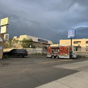 a taco truck parked in a parking lot