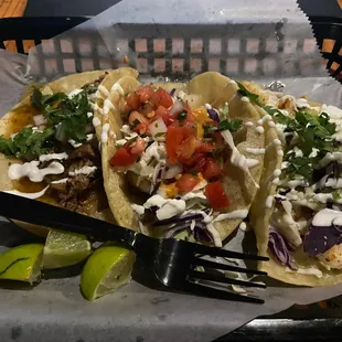 Three tacos, pastor, fish, shrimp