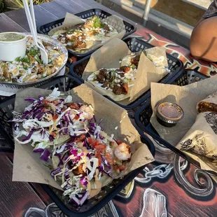 Surf &amp; turf tacos, steak tacos, caritas tacos, steak nachos, and last a steak burrito.