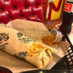 Bean and cheese burrito with mild red salsa and Coke