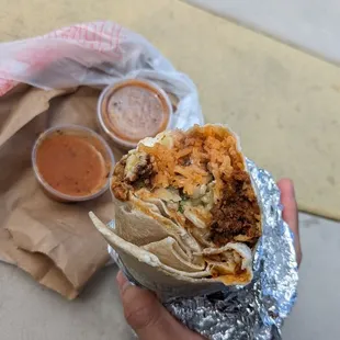 Super burrito with al pastor and &quot;spicy&quot; salsa