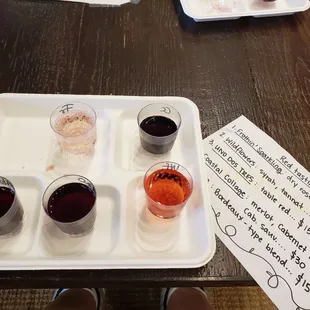 a sample of wine and a sample of dessert