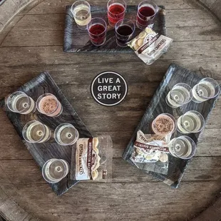 a table with snacks and wine glasses