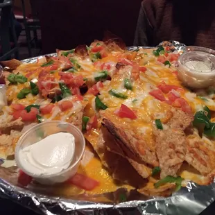 The nachos are huge here - they cover a whole pizza tray. Great for a group or, in our case, two people who just love nachos.