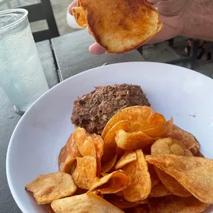 Pulled pork sandwich-slaw came with but it's off the plate here