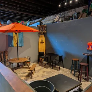 tables, chairs, and umbrellas
