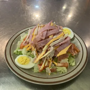 a salad with ham and hard boiled eggs