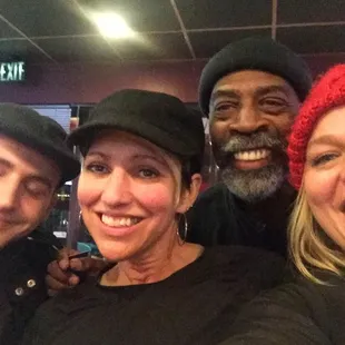 a group of people taking a selfie