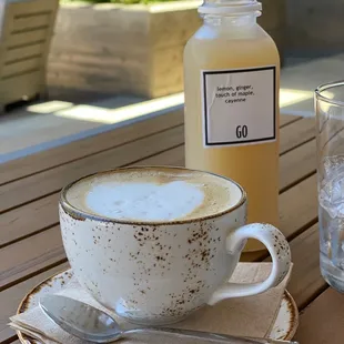 Oats milk latte and ginger drink.