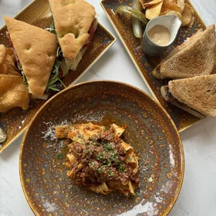 Fried Eggplant Sandwich, Pappardelle Bolognese, and House Made Pastrami Sandwich