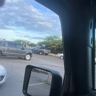 10 cars waiting patiently for the gate to open