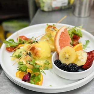 a plate of fruit and vegetables