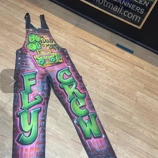 a pair of pants with graffiti on them