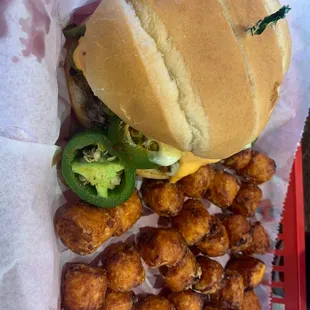 Jalapeño bacon burger with sweet potato tots