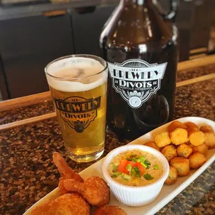 a plate of food and a beer