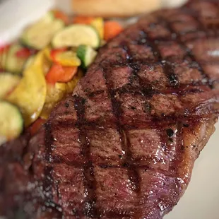 steak and vegetables on a plate
