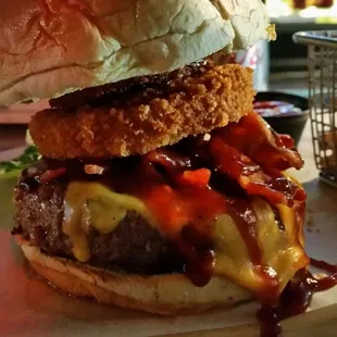 My husbands juicy Bacon Cheeseburger. Cooked medium well, and had lots of flavor!