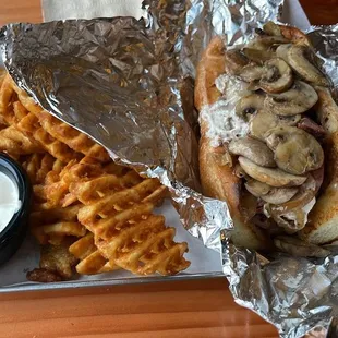 Tri-tip mushroom sandwich with waffle fries