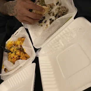 Phil&apos;s cheesesteak he ate it so fast I didn&apos;t get to take a picture and loaded tattar tots he said it was very good