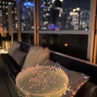The taste Flurry cocktail, one of the signature cocktails at Sandbar Rooftop's Flurry Lounge winter experience.