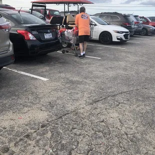 Customers walking out with shopping carts, which we were told was against policy.