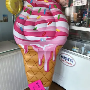 Win this pool float and a $25.00 scholarship! How? By winning our ice cream eating contest every Friday at 7:00. Or just come watch the fun!