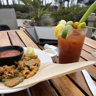 Calamari (meh) and Bloody Mary (decent - good spice)