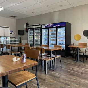 empty tables and chairs in a restaurant
