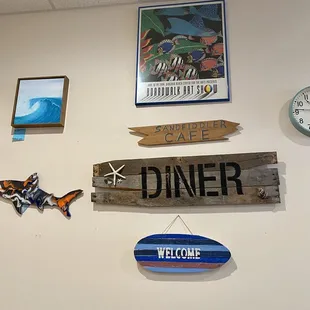 a variety of signs on the wall