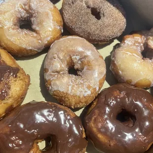 Chocolate glazed, vanilla glazed, powder sugar and cinnamon sugar