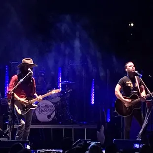 the band performing on stage