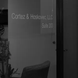 Cortez &amp; Hoskovec, LLC Suite 203