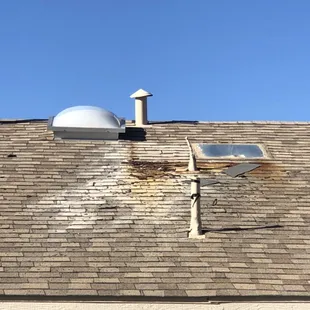 Roof damage from an old, leaking evaporative cooler.